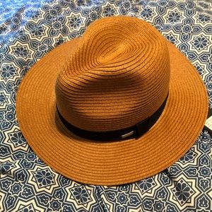 Summer hat. I never wear it. It’s a brand new hat